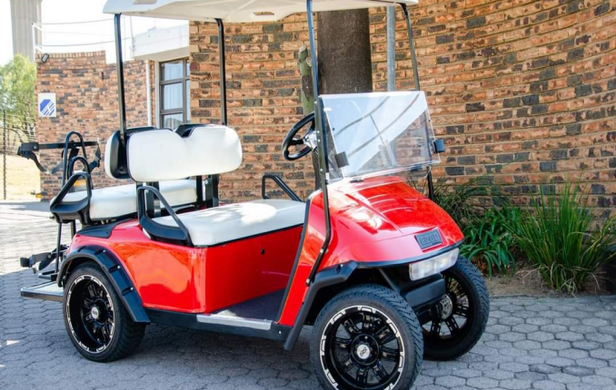 gallery/red club car 4 passenger petrol